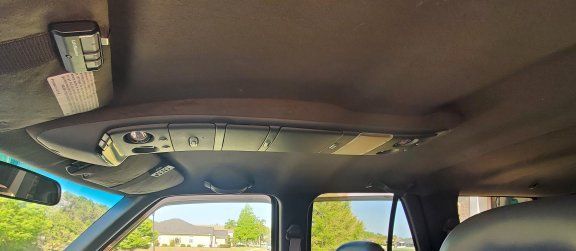 Long console, no sunroof.