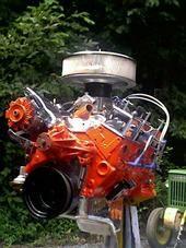 355 c.i., steel crank, TRW forged pistons, Pink Rods, double hump heads (64cc chambers, 2.02/1.64 valves, ported and polished, 7/16" screw in studs, roller rockers), Polished Eldebrock single plane intake, Holley 820 cfm double pumper w/ mechanical secondaries...all through long tube ceramic headers and 2 1/4" exhaust with Flowmasters...