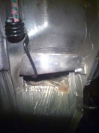Here you can see where I cut away the cracked sealant in the corner....