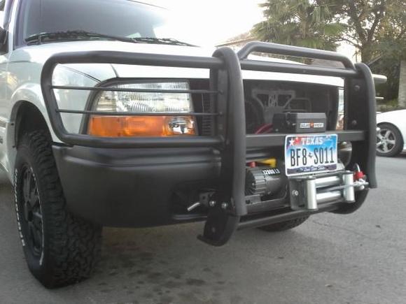 My homemade multipurpose front end: grill guard/winch mount/Stowmaster tow bar/light bar (lights not shown).