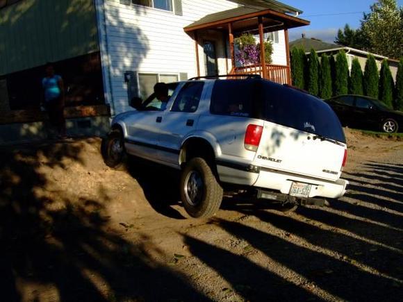 trying to climb a mound of dirt in my property
