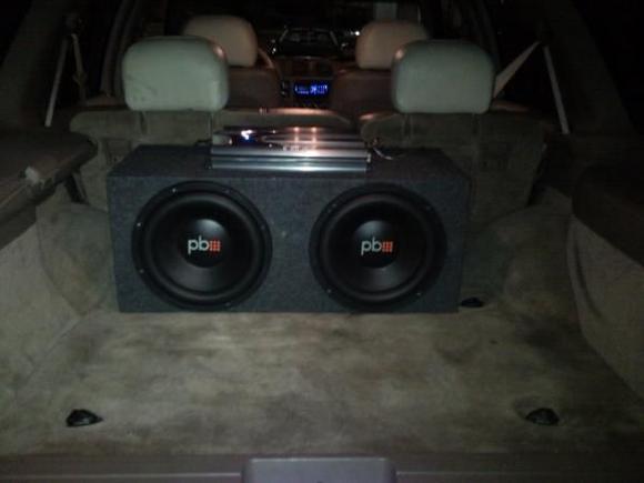 rear trunk w/ 2 12"'s and a 800w Power Acoustic amp this truck also has a bluetooth HD intergrated radio