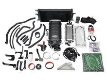 It os a com hrre is the $5500 Edelbrock E-Force kit. Dont fool plwith your intake or exhaust. Just buy this kit. It has an Eaton TVS 1.76 w/ 7 lbs of boost. Its positioned on top of the engine and makes 100 hp and 100 ftlbs of torque (SAE NET). I used a rewards card and got $500 off, which paid for tax and freight. It is good, clean horspower. (RWHP 379 RWD torque:325). 
 Did I mention the Edelbrock 3 year 36,000 mile POWERTRAIN warranty??? OMG.