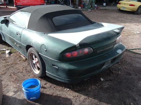 The new spoiler go fitted on, and the whole car wet sanded, getting ready for full paint.