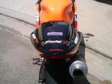solo seat and high mount twin brothers carbin fiber exhaust... ill trade some one for a GP shortie.