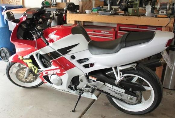 My clean new old motorcycle I can't ride because it keeps snowing.