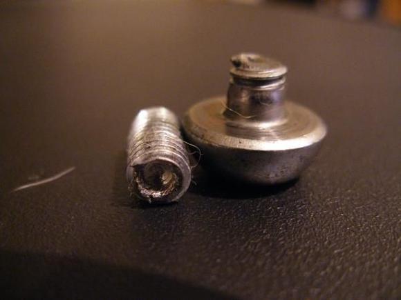 Broken rotor bolt. Rotor bolts are not meant to be used twice! I used a Grabit pro bolt extractor to remove bolt.
