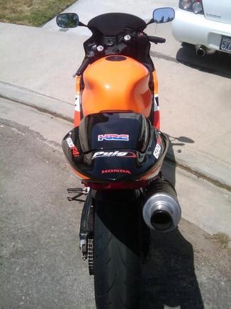 solo seat and high mount twin brothers carbin fiber exhaust... ill trade some one for a GP shortie.
