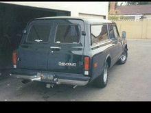my old burb in 1996 after it was painted, note the late model bumper mod