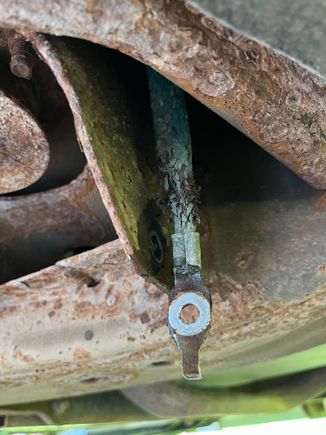 Attachment to the frame just behind the right passenger tire