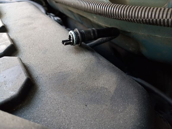Broken connector on PCV side, towards drivers side.