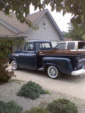 with new side rails to match oak bed