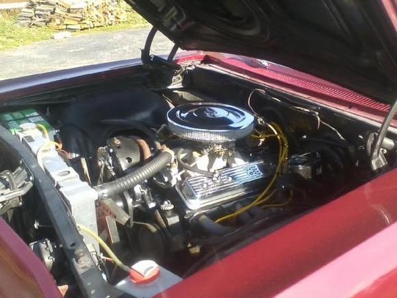Under the hood.  Original motor was a 396.  When I acquired it the motor had been replaced with a Jegs Crate engine - 350 bored to 355 CI, 385 HP.