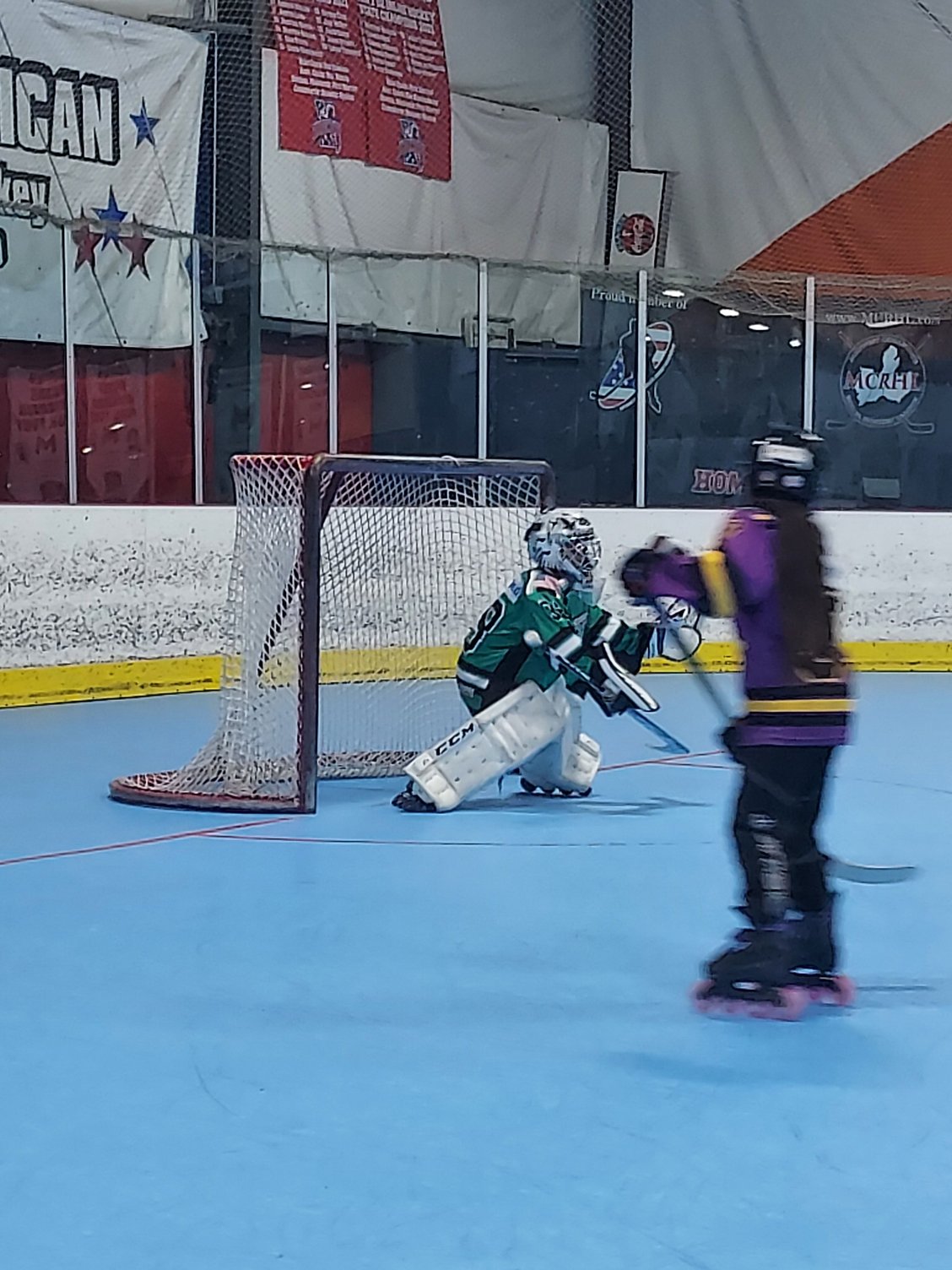 Keegan at Ice Hockey yesterday, preparing for a shot with perfect form!