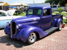 This 1938 Dodge 1/2 pu doesn't have a front or rear bumpers. It is tagged . It was drove to this car show. Yeah it  a street Rod . I have owned a built this myself . I still have it and it is a running truck I took it on a cruise 260 Miles round trip several years ago.