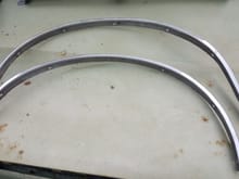 66 front fender wheel opening moldings