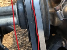 So the belt that’s circled in this picture not the alternator belt is loose and has a lot of slop in it How would I go about tightening it 