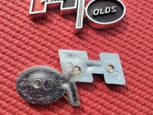 Hurst Olds Emblem. I believe these are 73-75 Hurst Olds console emblems. Other suppliers claim they are also used on 69-72. Emblem measures 2 1/2" x 1 1/4" and are made of Chrome plastic with correct Hurst Olds coloring. Does not have sticky back.
$20 each