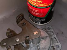 Because I could not determine how to remove this shaft, carb cleaner was the solution.