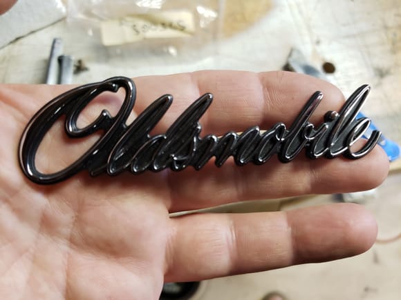 This Looks like a new unused uninstalled Oldsmobile emblem.
Got it in a stash of parts . I dont need it. Not sure what it is from it is smaller than the grill emblem on the 74- 75 b body. 
$45 shipped