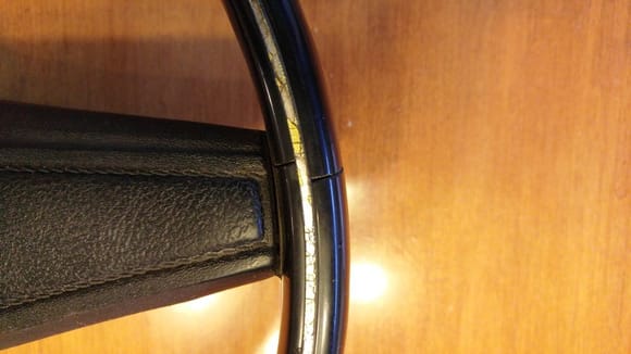 1972 Steering Wheel. Small Crack in side of wheel. Silver underlay completely intact. Clear overlay is yellowed and cracked with age.