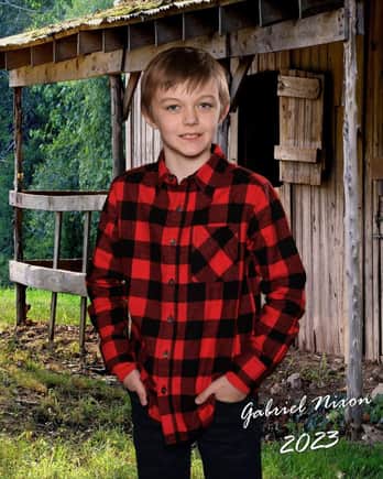 Our oldest Grandson Gabe, the beneficiary of the new basketball hoop. This is his latest school picture and it struck me how grown-up he's starting to look. He recently turned 10.