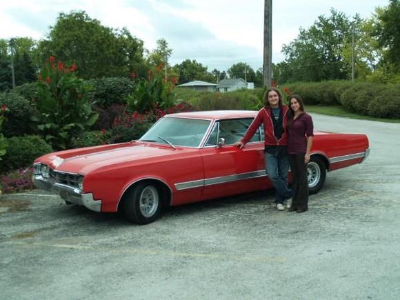 Me and my lovely girlfriend standing in front of my new Starfire, after a quickie paint job. (going to redo it when i have more time and less dead hores)