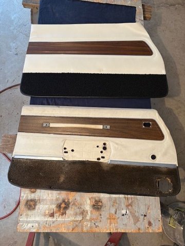 Old panel at bottom, with speaker hole in it, faded carpet bottom.  New kit fabric is the top 