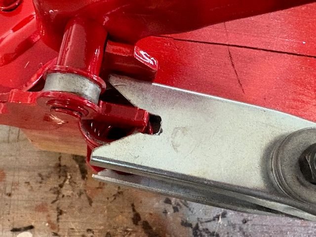 I had to cut a small notch in the V of the tool to allow it into position by the roller catch.  This was done earlier in process.