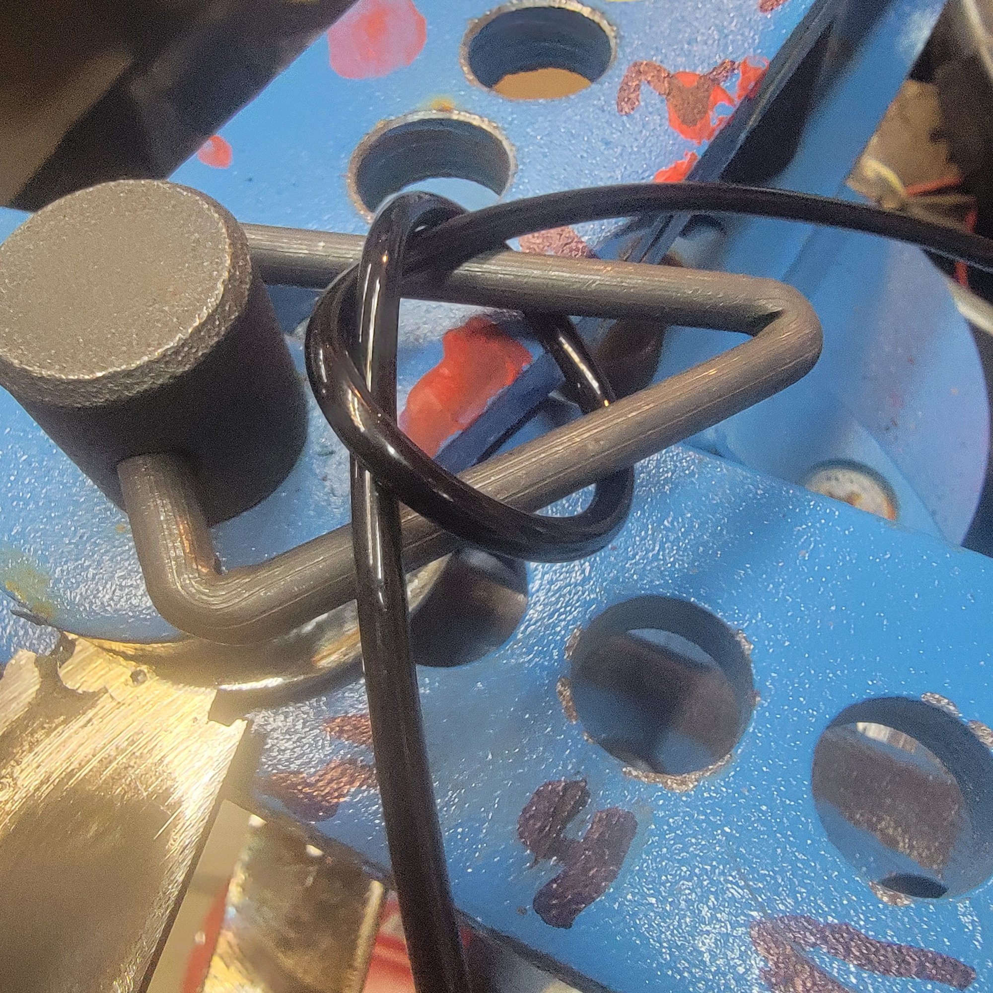 Really limber vacuum hard line. The knot is about 1in in diameter.