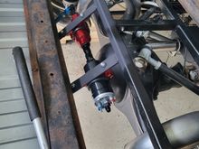 Pump and filter. The bracket is welded top and bottom to the frame. 