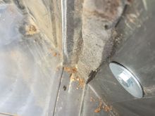 The head of my fix - 1/4-20 screw, 1.5" long, with a fender washer on it.