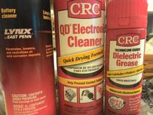 I couldn't find "rusty" as you suggested but the LYNX on left in picture is supposed to neutralize battery acid and be able to spray into the wiring harness according to the auto parts store manager. The QD Cleaner is for oxidation cleaning and then the dielectric grease for after contacts are cleaned.  I will work on going through all the wiring harness and grounds as you suggested. I'll post results when done.