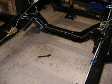I split the line going across the frame. In case something happens, itll be easier to remove and replace. Yes that is a double flair union, not a compression fitting. 