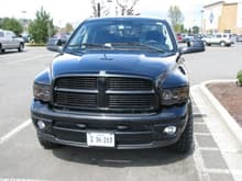 Front shot with new tow mirrors, smoked projectors, and blacked out grill.