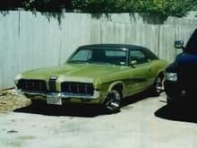 1970 Mercury Cougar ... I know the pic is tiny, havent taken any pics of it in a long time. It sits under a cover in the garage until I have about $10G's to throw at it since all the brakes, suspension and various other stuff needs to be updated before its relaible transportation again.