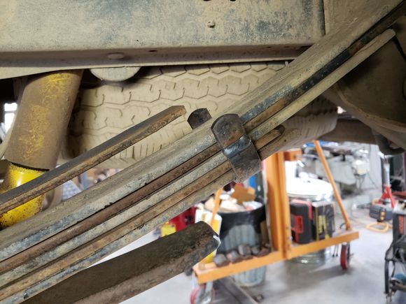 I simply cut the clamps, run them vertically and weld. Old rockcrawler trick to allow the leafs to fan at droop...not that this truck will be flexy or doing any 'crawling....