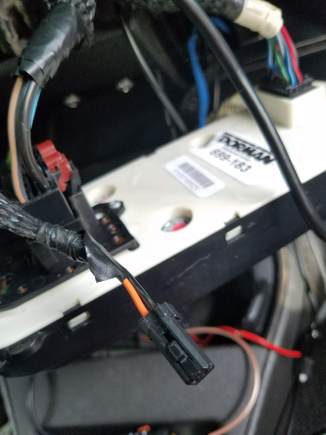 What is this connector with the black and orange wires?