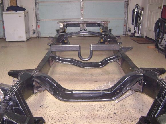 It would replace this weird shaped cross member. And I would add a top part also, to close it up. 