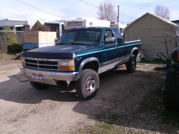 Cranked up the torsion bars, 2" body lift, custom diamond plate skid plate to protect the tranny cooler lines.