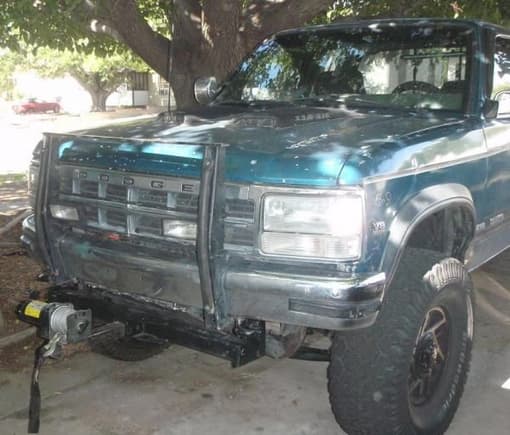 Old winch mounted on reciver hitch.