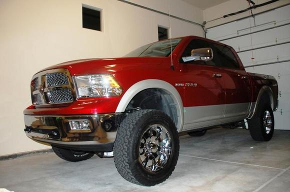 My 2009 Dodge Ram 1500 Laramie Crew 4X4 with Hemi - LIFTED with 6-inch Pro Comp Stage 1 suspension system; parked in the garage.