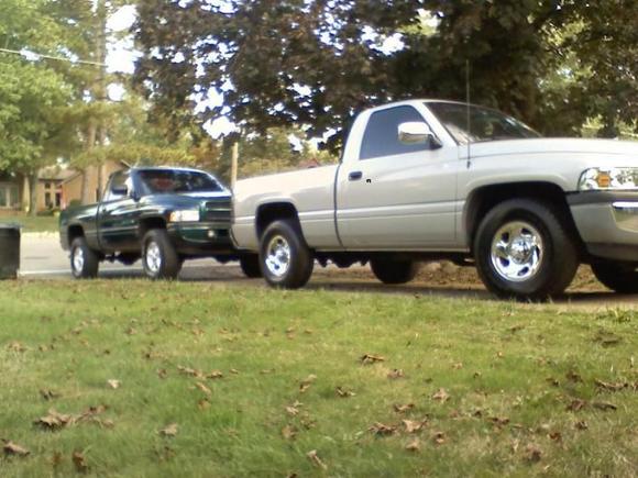 my buddy's 96 ram with a 360 2wd,lowering kit, hid and hid fogs, 20% tint and 12's and mine in the back
