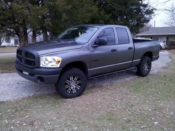 Leveling kit, 17x8" Helo 835 Rims, 285/70 BFG AT/KOs, N-Fab steps, Tinted front windows to match rear, Plasti-Dipped emblems, DupliColor Bed Armor over the rail, added factory Cruise Controls