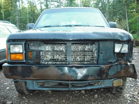 Passenger side, not too bad.  Driver's side, terrible.  That's the result of a pole on a winter day.  Thanks dad.  Eh.