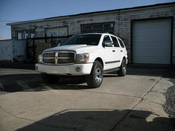 285/70/17s and Chrome grill and mirrors.