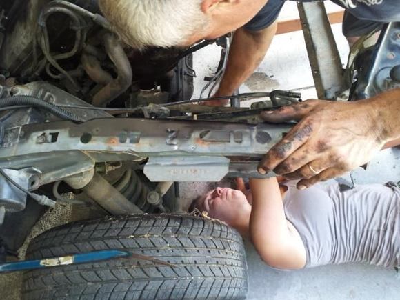 I was the only one small enough to be able to remove the engine mounts...