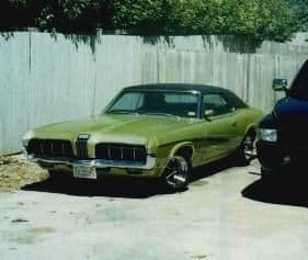 1970 Mercury Cougar ... I know the pic is tiny, havent taken any pics of it in a long time. It sits under a cover in the garage until I have about $10G's to throw at it since all the brakes, suspension and various other stuff needs to be updated before its relaible transportation again.