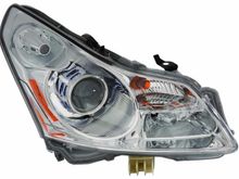 It’s the round part where the headlight bulb goes into