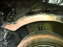 He should redo the bondo job, it's never going to look perfect though... This job falls squarely into my "never again" category